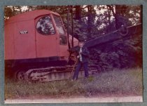 Woman with shovel on site for new library